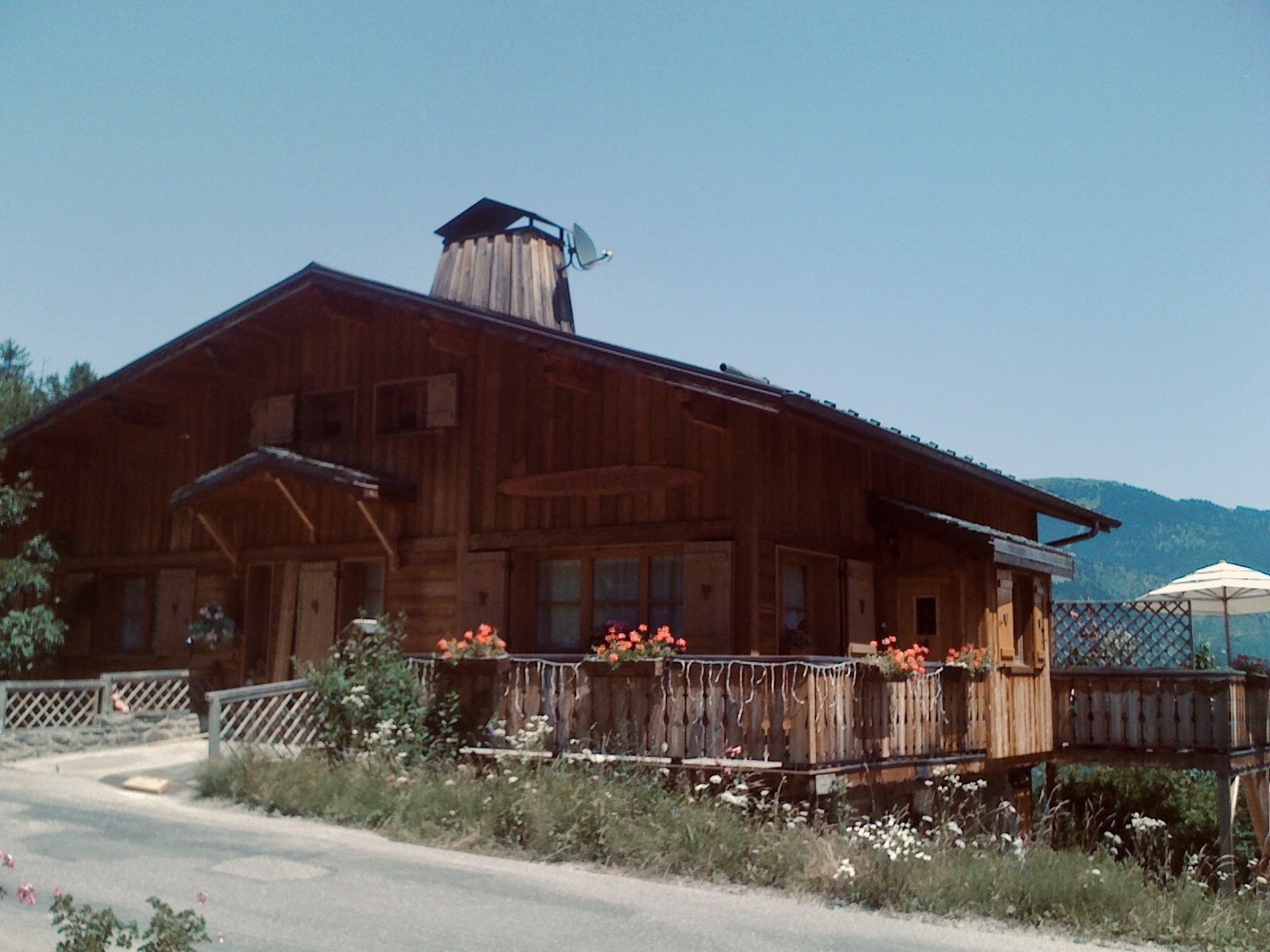 The wooden chalet in summer in Les Allues